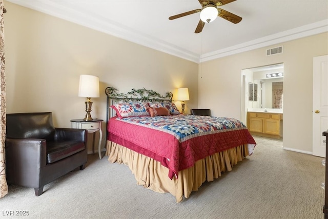 bedroom featuring ceiling fan, connected bathroom, light colored carpet, visible vents, and baseboards