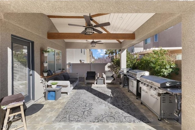 view of patio / terrace featuring outdoor lounge area, area for grilling, fence, a ceiling fan, and grilling area