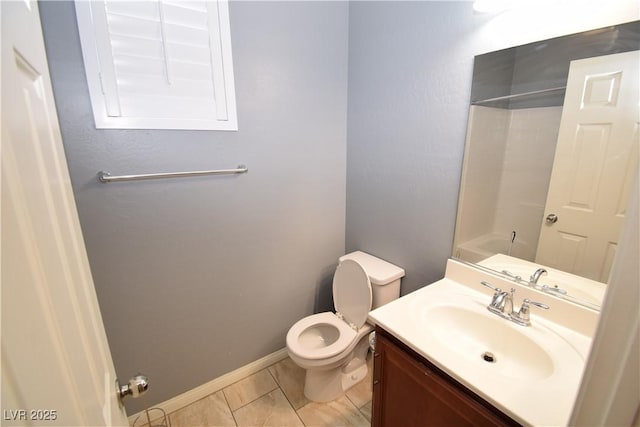 full bath with baseboards, vanity, toilet, and walk in shower