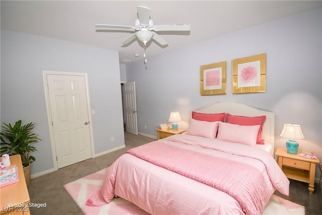 bedroom with carpet, a ceiling fan, and baseboards