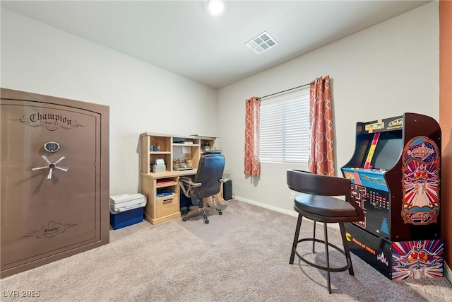 home office featuring visible vents, carpet flooring, baseboards, and lofted ceiling