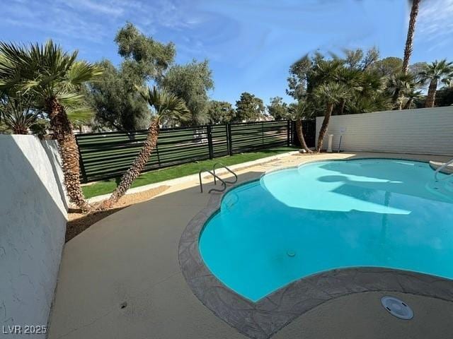 view of pool with a fenced in pool and a fenced backyard