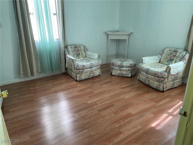 living area with wood finished floors