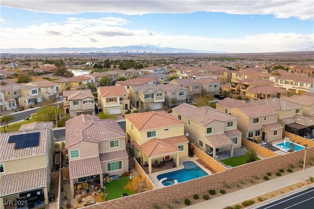 birds eye view of property featuring a residential view and a mountain view