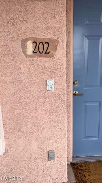 details featuring stucco siding