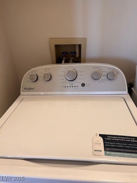 laundry area featuring laundry area and washer / clothes dryer