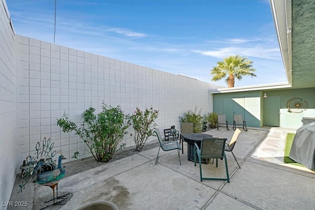 view of patio with outdoor dining area