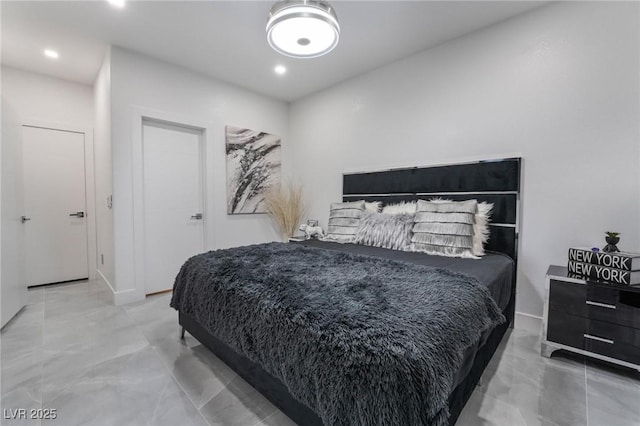 bedroom with recessed lighting