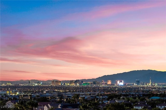 property view of mountains featuring a city view