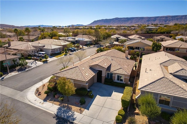 aerial view featuring a residential view and a mountain view