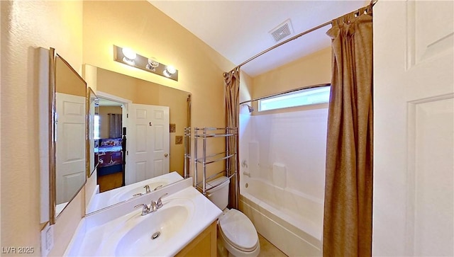 bathroom with toilet, vanity, shower / bath combination with curtain, and visible vents