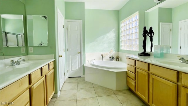 bathroom with tile patterned flooring, a sink, a bath, and a shower stall