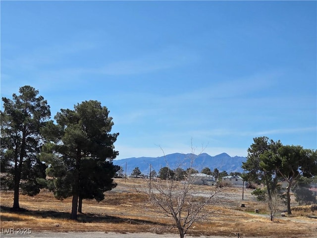 property view of mountains featuring a rural view