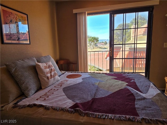 bedroom featuring access to outside