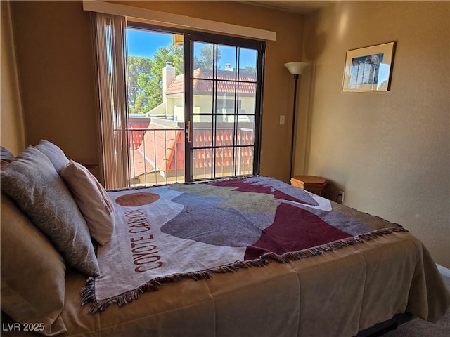 bedroom with access to outside