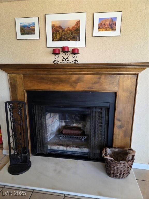 interior details featuring a fireplace