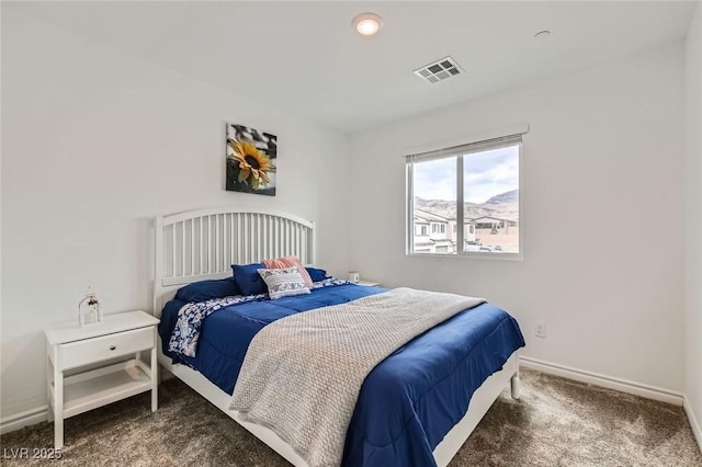 bedroom featuring carpet, visible vents, and baseboards