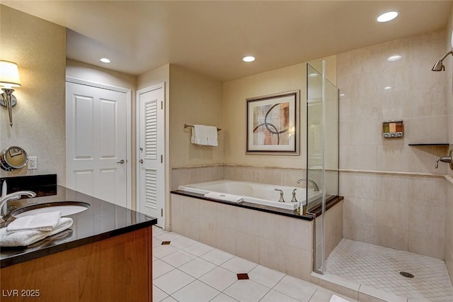 full bath featuring vanity, tiled shower, recessed lighting, tile patterned flooring, and a garden tub