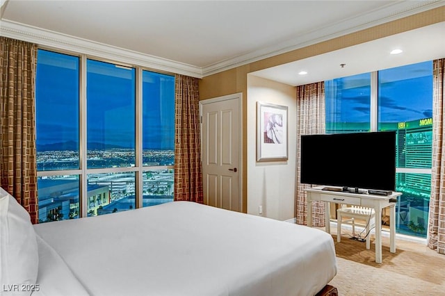 bedroom with carpet flooring and ornamental molding