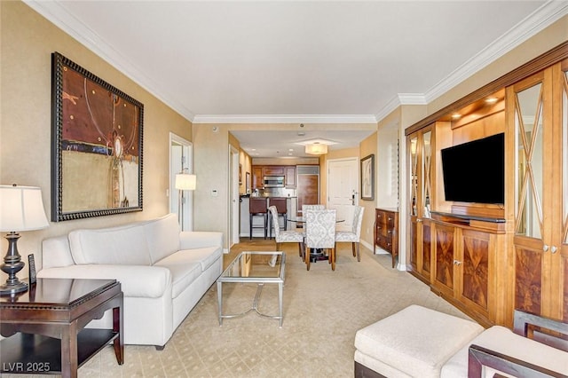 living room featuring crown molding