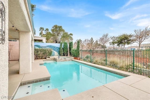 view of pool with a patio area, a fenced backyard, and a pool with connected hot tub