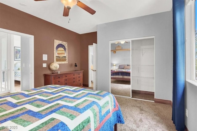 bedroom featuring a ceiling fan, a closet, carpet flooring, and baseboards