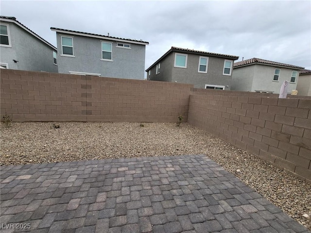 view of patio with a fenced backyard