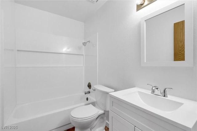 full bathroom featuring washtub / shower combination, vanity, and toilet