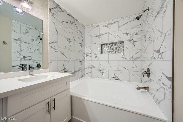 bathroom featuring shower / bath combination and vanity