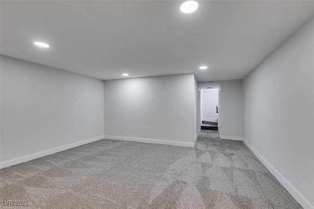 finished basement with recessed lighting, baseboards, and carpet floors