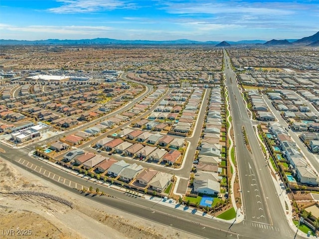 aerial view featuring a residential view and a mountain view