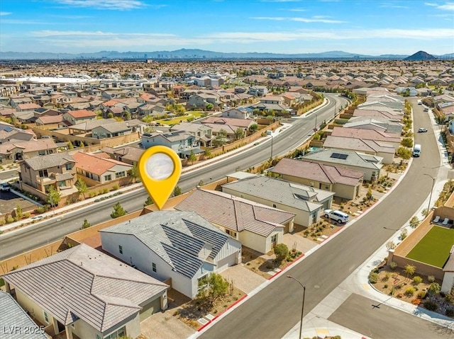 drone / aerial view with a mountain view and a residential view