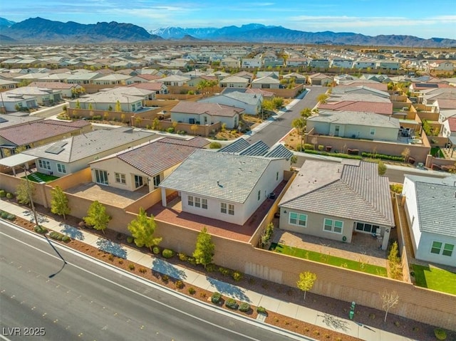 birds eye view of property featuring a residential view and a mountain view