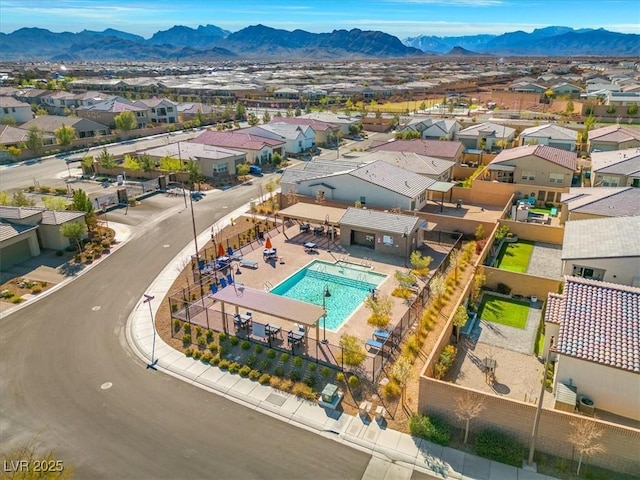 drone / aerial view with a mountain view and a residential view