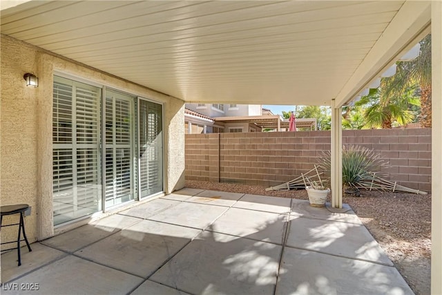 view of patio / terrace with fence