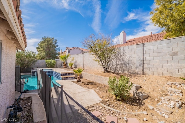 view of patio with a fenced backyard and a fenced in pool