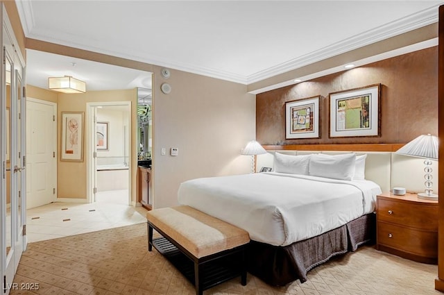 bedroom with light tile patterned floors, connected bathroom, baseboards, and crown molding