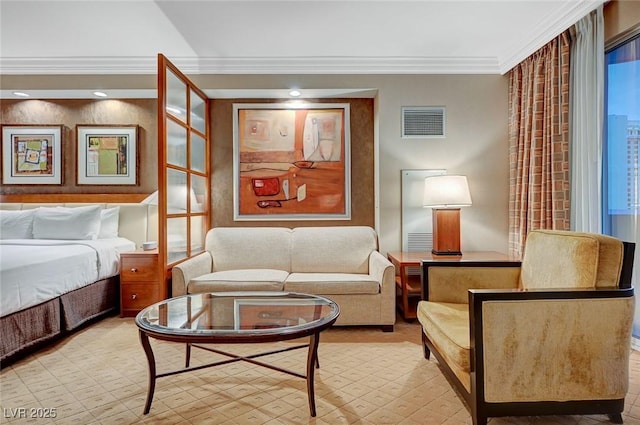 bedroom featuring visible vents and crown molding