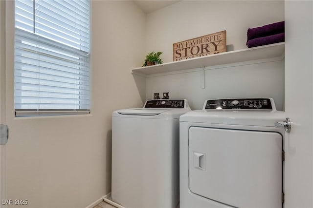 laundry area featuring laundry area and washing machine and clothes dryer