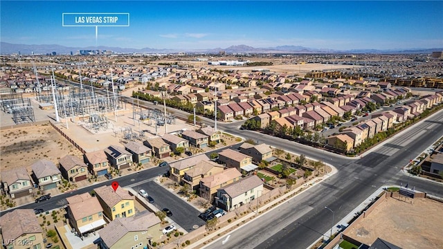 aerial view with a mountain view and a residential view