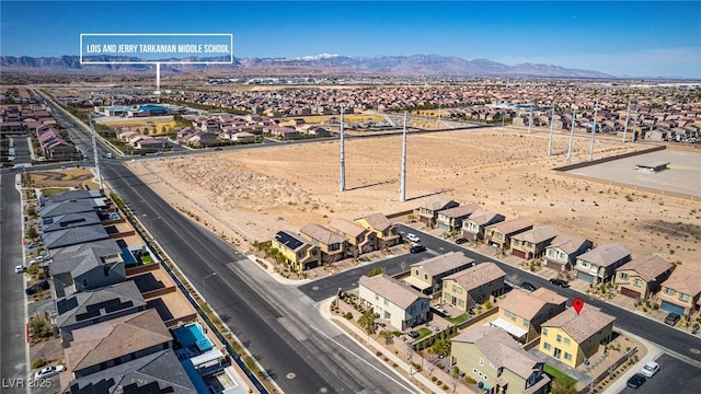 bird's eye view with a residential view and a mountain view