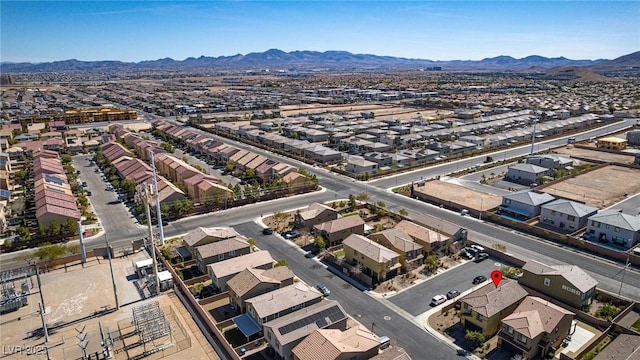 bird's eye view with a residential view and a mountain view