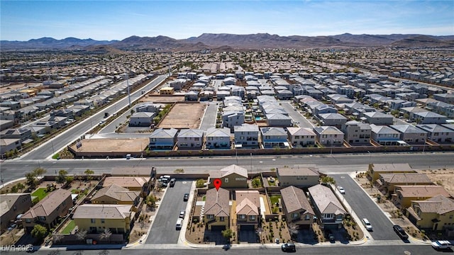 bird's eye view featuring a residential view and a mountain view