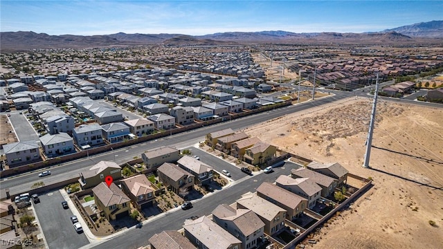 aerial view with a mountain view and a residential view