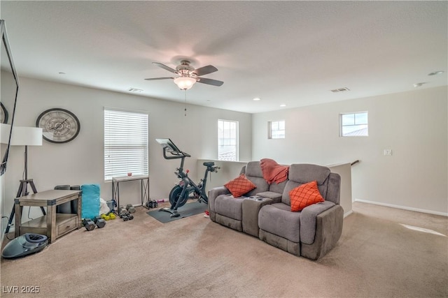 living area featuring visible vents, recessed lighting, a ceiling fan, and carpet