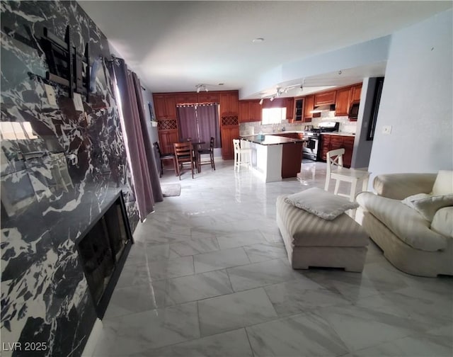 living room featuring marble finish floor