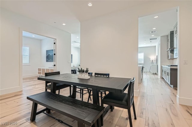 dining area featuring visible vents, recessed lighting, baseboards, and light wood-style floors