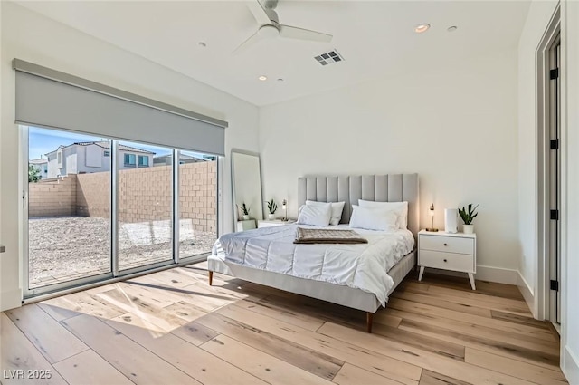 bedroom with visible vents, baseboards, light wood-type flooring, recessed lighting, and access to outside