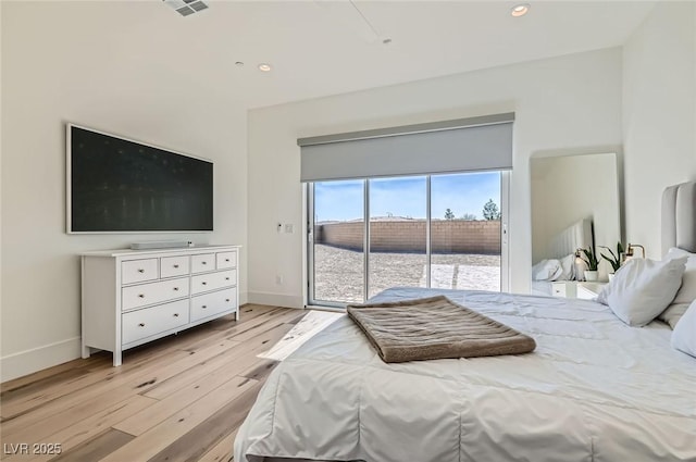 bedroom featuring visible vents, baseboards, recessed lighting, light wood-style floors, and access to outside