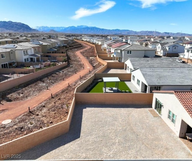 bird's eye view featuring a mountain view and a residential view